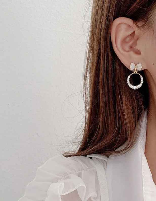 Bow Hollow Circle Earrings white shop now
