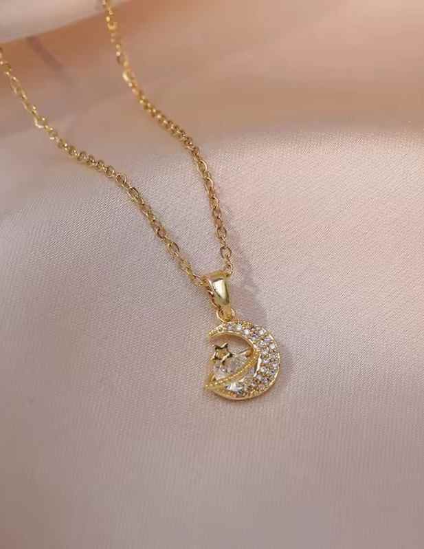 Golden Moon And Star Pendant shop now