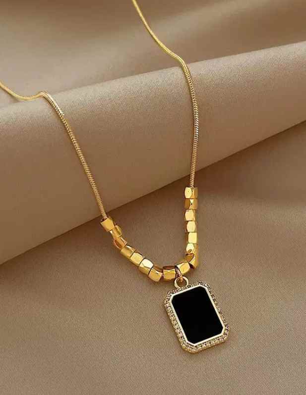 Black Pendant With Gold Beads
