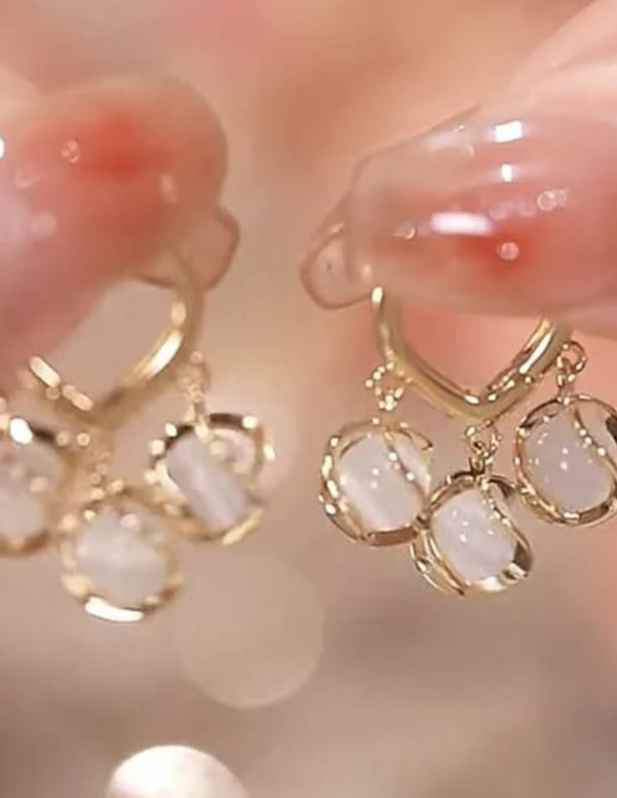 Shop Three Small Pearl Earrings