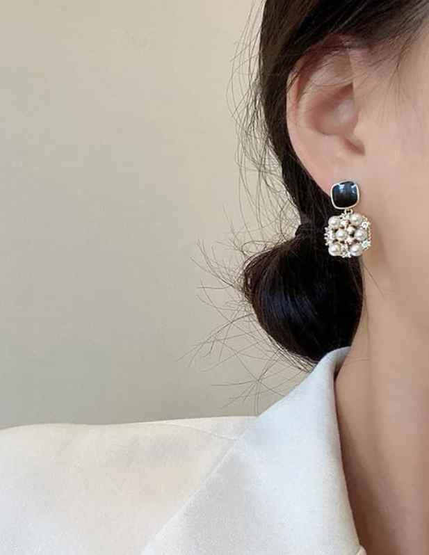 black and white drop earring