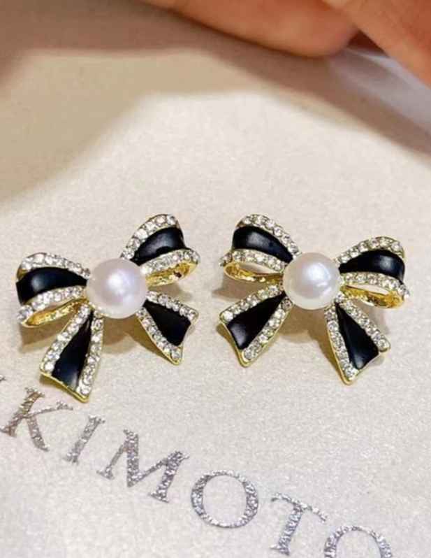 White Stone Bow Earrings buy at wooshanta
